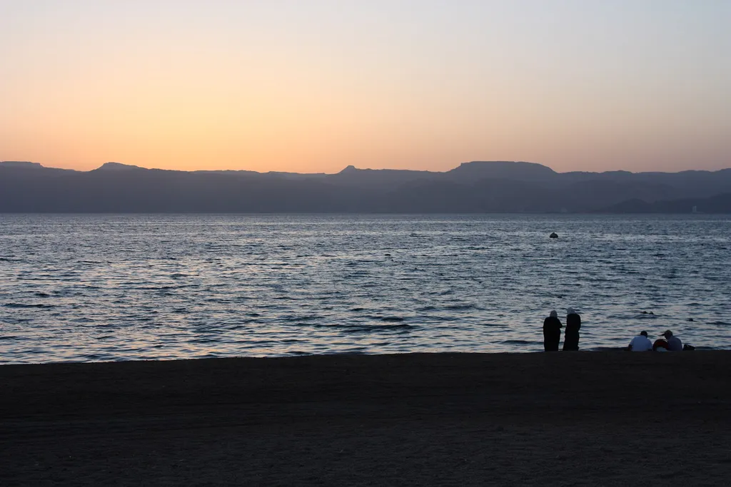 Sunset over the Gulf of Aqaba, with the mountains across the water