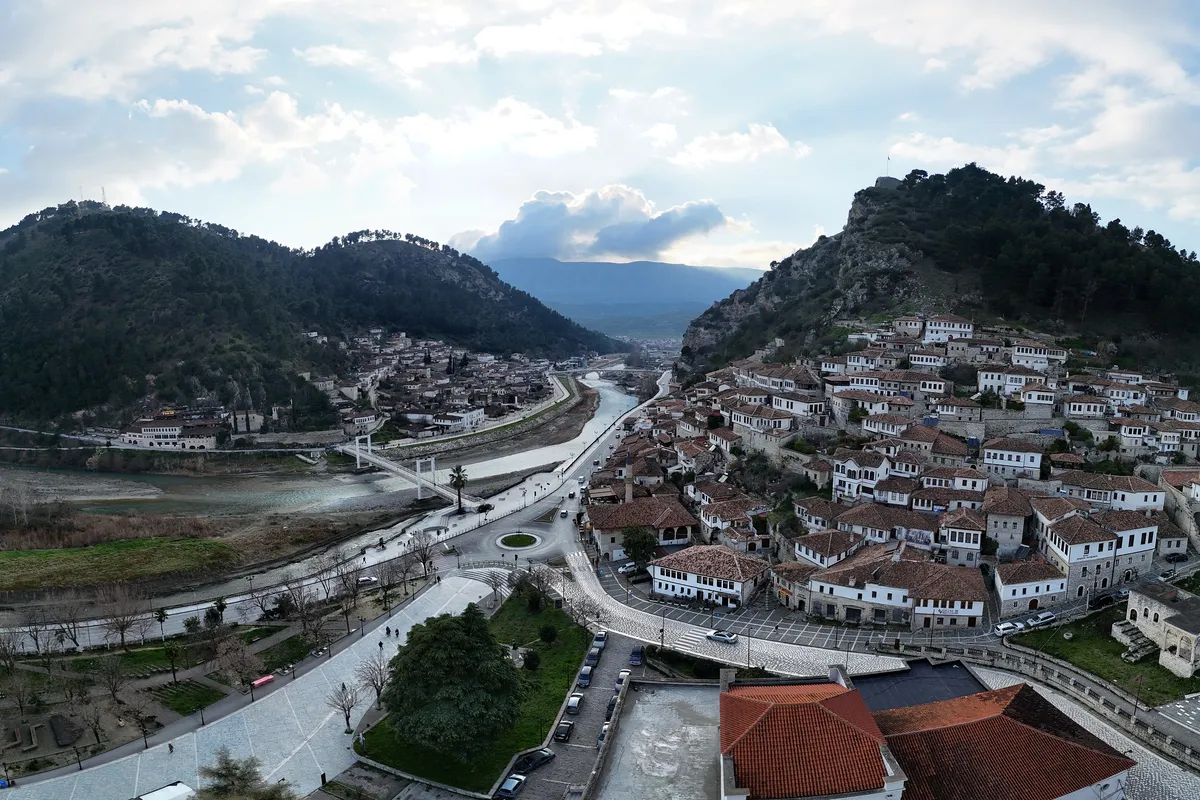 Panorama of Berat old town and the Osum River in Albania, with the Mangalem quarter climbing towards the castle hill