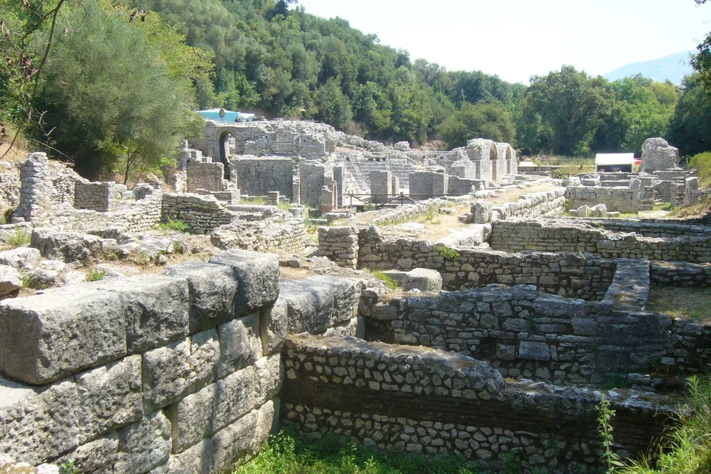 Ancient stone ruins of the Butrint archaeological site among the trees in southern Albania