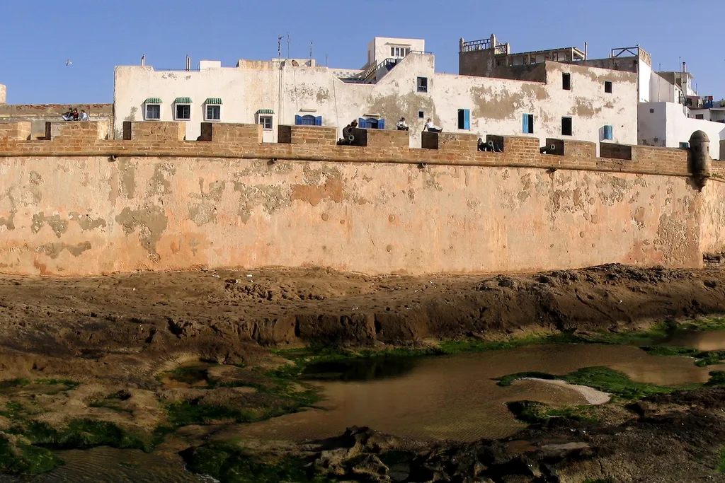 Historic stone ramparts along the Atlantic waterfront in Essaouira, Morocco