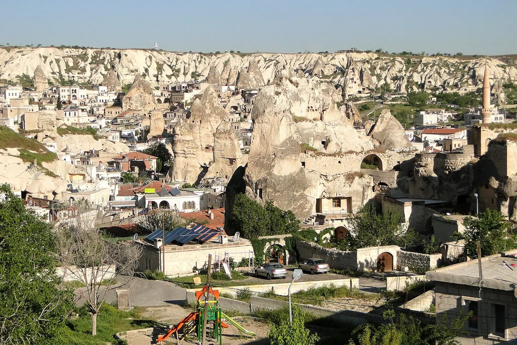 The town of Göreme in Cappadocia, its houses and cave dwellings built among fairy chimneys