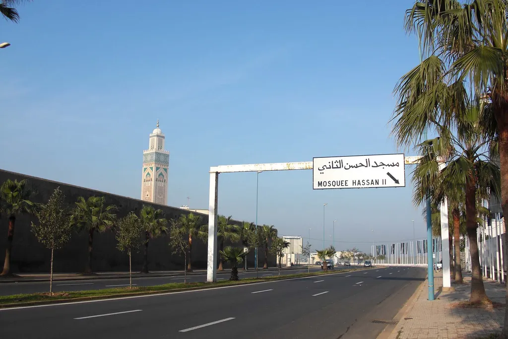 The Hassan II Mosque in Casablanca, Morocco, with its tall minaret beside the Atlantic Ocean