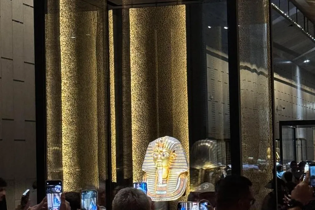 The golden funerary mask of Tutankhamun on display in the Grand Egyptian Museum