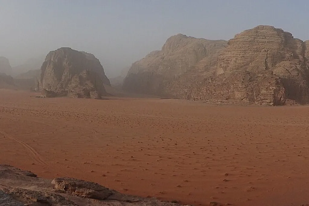 Red sand and sandstone mountains in Wadi Rum, Jordan
